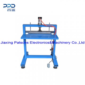 Aluminium foil roll sawtooth binding machine